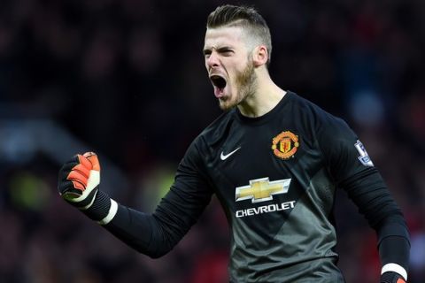MANCHESTER, ENGLAND - DECEMBER 14:  David De Gea of Manchester United celebrates the first goal during the Barclays Premier League match between Manchester United and Liverpool at Old Trafford on December 14, 2014 in Manchester, England.  (Photo by Shaun Botterill/Getty Images)
