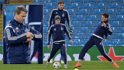 Dynamo Kiev's players Vitaliy Buyalskyi (C) and Oleksandr Yakovenko (R) take part in a training session at the Etihad Stadium in Manchester, north west England, on March 14, 2016.  
Manchester City play Dynamo Kiev in a UEFA Champions League last 16, second leg football match at the Etihad Stadium on March 15. / AFP PHOTO / OLI SCARFFOLI SCARFF/AFP/Getty Images
