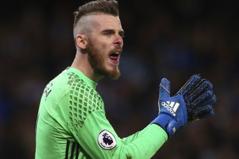 Manchester United's goalkeeper David de Gea reacts during the English Premier League soccer match between Manchester City and Manchester United at the Etihad Stadium in Manchester, England,Thursday, April 27, 2017.(AP Photo/Dave Thompson)