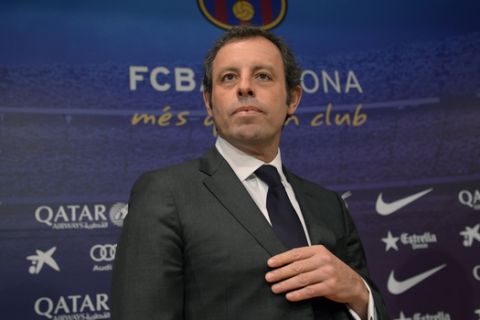 FC Barcelona's president Sandro Rosell, attends a press conference at the Camp Nou stadium in Barcelona, Spain, Thursday, Jan 23, 2014. Sandro Rosell is stepping down as president of Barcelona a day after a judge agreed to hear a lawsuit accusing him of allegedly hiding the cost of the transfer of Brazil striker Neymar.Rosell says he is resigning after an emergency meeting with Barcelona's board of directors on Thursday. Rosell says vice president Josep Bartomeu will take his place as president and finish the term that expires in 2016. Elected in 2010 to replace outgoing president Joan Laporta, Rosell said last April he planned to run for re-election in 2016. (AP Photo/Manu Fernandez)