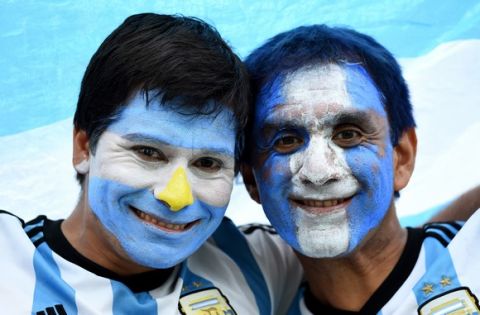 SAO PAULO, BRAZIL - JULY 09:  Argentina fans enjoy the atmosphere prior to the 2014 FIFA World Cup Brazil Semi Final match between the Netherlands and Argentina at Arena de Sao Paulo on July 9, 2014 in Sao Paulo, Brazil.  (Photo by Matthias Hangst/Getty Images)