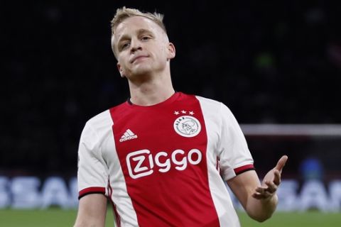 Ajax's Donny van de Beek reacts as a pass for him went out during the group H Champions League soccer match between Ajax and Valencia at the Johan Cruyff ArenA in Amsterdam, Netherlands, Tuesday, Dec. 10, 2019. (AP Photo/Peter Dejong)