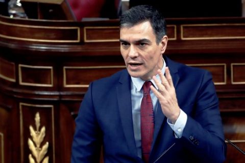 Spain's Prime Minister, Pedro Sanchez speaks at a parliamentary session in Madrid, Spain, Thursday, April 9, 2020. Sanchez acknowledged that Spain's government, and its regions which administer health services, were caught off guard by the crisis and left its hospitals woefully short on critical supplies, including  coronavirus tests and protective clothing for medical workers. (Mariscal, Pool Photo via AP)