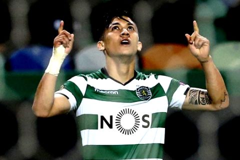 Sporting's Fredy Montero celebrates after scoring the opening goal during the Europa League round of 16 first leg soccer match between Sporting CP and FC Viktoria Plzen at the Alvalade stadium in Lisbon, Thursday March 8, 2018. (AP Photo/Armando Franca)