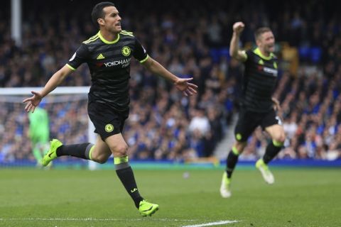 Chelsea's Pedro celebrates scoring his side's first goal of the game during their English Premier League soccer match against Everton at Goodison Park, Liverpool, England, Sunday, April 30, 2017. (Nigel French/PA via AP)