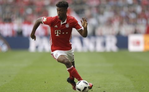Bayern's Kingsley Coman controls the ball during the German Bundesliga soccer match between FC Bayern Munich and 1. FC Cologne at the Allianz Arena stadium in Munich, Germany, Saturday, Oct. 1, 2016. (AP Photo/Matthias Schrader)