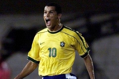 Brazil's Rivaldo celebrates after scoring his team's first goal during an America's Cup quarterfinal game against Argentina in Ciudad del Este, Paraguay, Sunday, July 11, 1999. (AP Photo/Daniel Jayo)