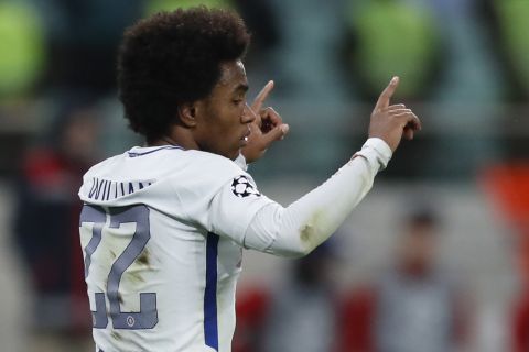Chelsea's Willian celebrates after scoring his sides second goal during their Champions League, group C, soccer match between Qarabag FK and Chelsea at the Baku Olympic stadium in Baku, Azerbaijan, Wednesday, Nov. 22, 2017. (AP Photo/Pavel Golovkin)