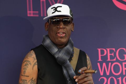 Dennis Rodman poses on the blue carpet at the Pegasus World Cup Invitational Horse Race, Saturday, Jan. 26, 2019, at Gulfstream Park in Hallandale Beach, Fla. (AP Photo/Lynne Sladky)