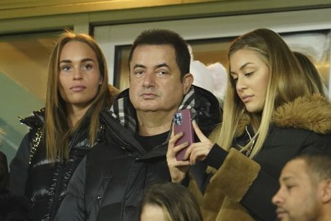 Turkish businessman and media tycoon Acun Ilcal, center, watches the English FA Cup third round soccer match between Hull City and Everton at the MKM Stadium in Hull, England, Saturday, Jan. 8, 2022. (AP Photo/Jon Super)