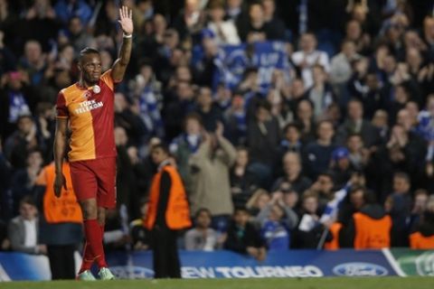 Galatasaray's Ivorian forward Didier Drogba acknowledges the crowd at the end of the UEFA Champions League round of 16 second leg football match between Chelsea and Galatasaray at Stamford Bridge in London, on March 18, 2014. AFP PHOTO / ADRIAN DENNIS        (Photo credit should read ADRIAN DENNIS/AFP/Getty Images)