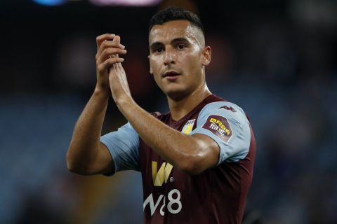 Aston Villa's Anwar El Ghazi applauds to supporters at the end of the English Premier League soccer match between Aston Villa and Everton at Villa Park in Birmingham, England, Friday, Aug. 23, 2019. (AP Photo/Rui Vieira)