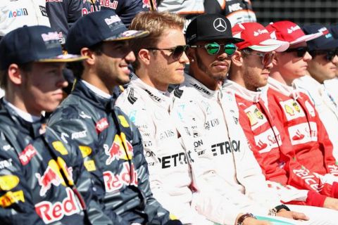 MELBOURNE, AUSTRALIA - MARCH 20: Lewis Hamilton of Great Britain and Mercedes GP sits with the rest of the F1 drivers ahead of the Australian Formula One Grand Prix at Albert Park on March 20, 2016 in Melbourne, Australia.  (Photo by Mark Thompson/Getty Images)
