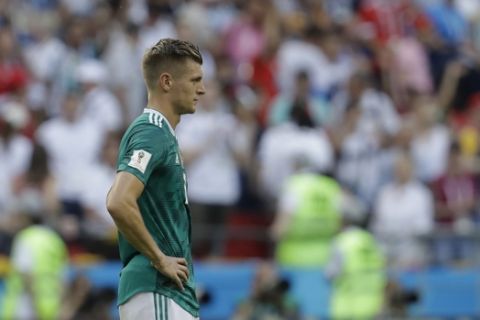 Germany's Toni Kroos looks dejected after Germany was eliminated during the group F match between South Korea and Germany, at the 2018 soccer World Cup in the Kazan Arena in Kazan, Russia, Wednesday, June 27, 2018. (AP Photo/Michael Probst)