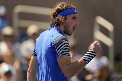 Stefanos Tsitsipas, of Greece, reacts during a match against Dominic Stricker, of Switzerland, during the second round of the U.S. Open tennis championships, Wednesday, Aug. 30, 2023, in New York. (AP Photo/Manu Fernandez)