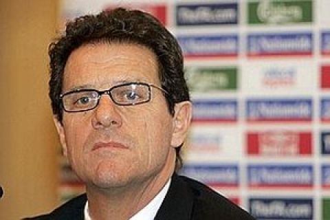 British national soccer team coach Fabio Capello ponders a question during a press conference held in Paris Tuesday March 25, 2008. England will play against France in an international friendly soccer match Wednesday March 26.(AP Photo/Remy de la Mauviniere)
