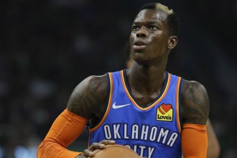 Oklahoma City Thunder's Dennis Schroder shoots a free throw during the first half of an NBA basketball game against the Milwaukee Bucks Wednesday, April 10, 2019, in Milwaukee. (AP Photo/Aaron Gash)