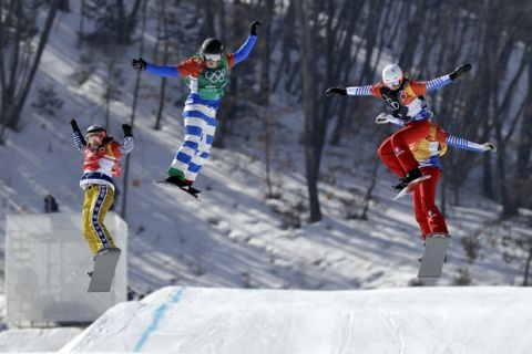 From left; Eva Samkova, of the Czech Republic, Michela Moioli, of Italy, De Sousa Mabileau Julia Pereira, of France, and Chloe Trespeuch, of France, run the course during the women's snowboard finals at Phoenix Snow Park at the 2018 Winter Olympics in Pyeongchang, South Korea, Friday, Feb. 16, 2018. (AP Photo/Kin Cheung)