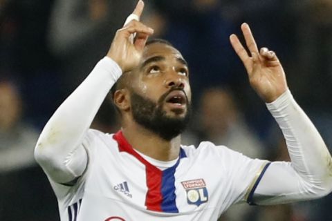 Lyon's Alexandre Lacazette celebrates scoring during the second leg semi final soccer match between Olympique Lyon and Ajax in the Stade de Lyon, Decines, France, Thursday, May 11, 2017. (AP Photo/Laurent Cipriani)