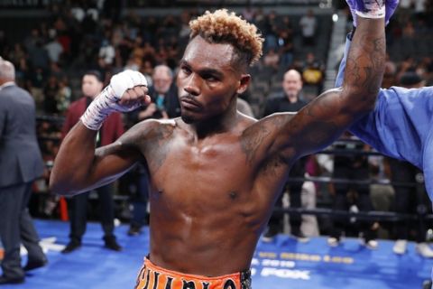 Jermell Charlo celebrates after defeating Jorge Cota, of Mexico, in a junior middleweight boxing match Sunday, June 23, 2019, in Las Vegas. (AP Photo/John Locher)