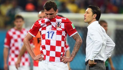 RECIFE, BRAZIL - JUNE 23:  Mario Mandzukic and head coach Niko Kovac of Croatia look dejected after a 3-1 defeat in the 2014 FIFA World Cup Brazil Group A match between Croatia and Mexico at Arena Pernambuco on June 23, 2014 in Recife, Brazil.  (Photo by Jamie McDonald/Getty Images)