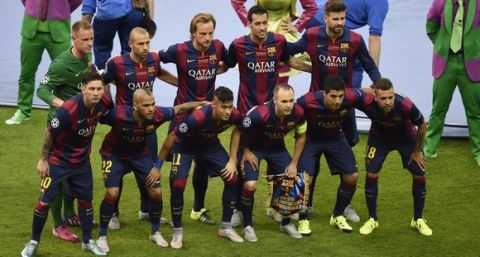 Players of FC Barcelona pose for a team picture prior to the UEFA Champions League Final football match between Juventus and FC Barcelona at the Olympic Stadium in Berlin on June 6, 2015.     AFP PHOTO / ODD ANDERSEN        (Photo credit should read ODD ANDERSEN/AFP/Getty Images)