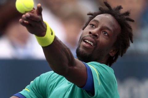 Gael Monfils, of France, returns a shot from David Goffin, of Belgium, during the third round of the U.S. Open tennis tournament, Saturday, Sept. 2, 2017, in New York. (AP Photo/Andres Kudacki)