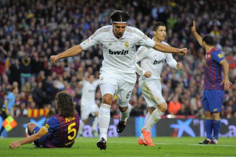 BARCELONA, SPAIN - APRIL 21:  Sami Khedira of Real Madrid CF celebrates after scoring the opening goal during the La Liga match between FC Barcelona and Real Madrid at Camp Nou on April 21, 2012 in Barcelona, Spain.  (Photo by David Ramos/Getty Images)