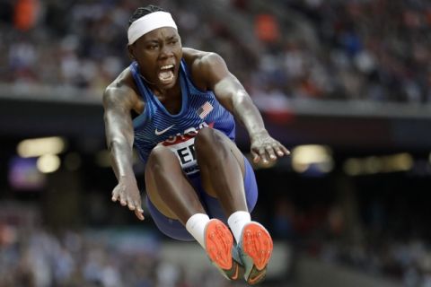 United States' gold medal winner Brittney Reese makes an attempt in the women's long jump final during the World Athletics Championships in London Friday, Aug. 11, 2017. (AP Photo/Matthias Schrader)
