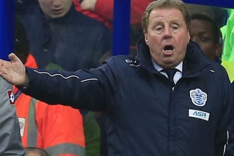Queens Park Rangers' manager Harry Redknapp reacts as he watches his team play against Sunderland during their English Premier League soccer match at Loftus Road stadium, London, Saturday, March 9, 2013. (AP Photo/Sang Tan)