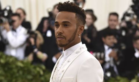 Lewis Hamilton attends The Metropolitan Museum of Art's Costume Institute benefit gala celebrating the opening of the Heavenly Bodies: Fashion and the Catholic Imagination exhibition on Monday, May 7, 2018, in New York. (Photo by Evan Agostini/Invision/AP)