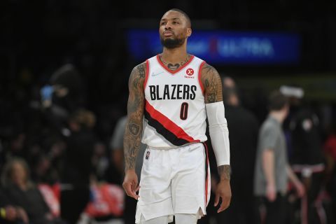 Portland Trail Blazers guard Damian Lillard (0) seen while playing the Los Angeles Lakers in an NBA basketball game, Friday Dec. 31, 2021, in Los Angeles. (AP Photo/John McCoy)