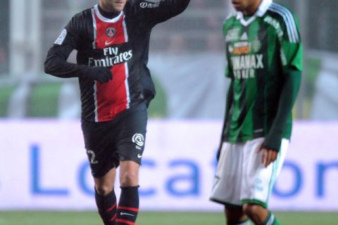 Paris' French midfielder Mathieu Bodmer (L) celebrates after scoring a goal during the French L1 football match Saint-Etienne vs PSG on December 21, 2011 at the Geoffroy-Guichard stadium in Saint-Eienne.  AFP PHOTO PHILIPPE MERLE (Photo credit should read PHILIPPE MERLE/AFP/Getty Images)