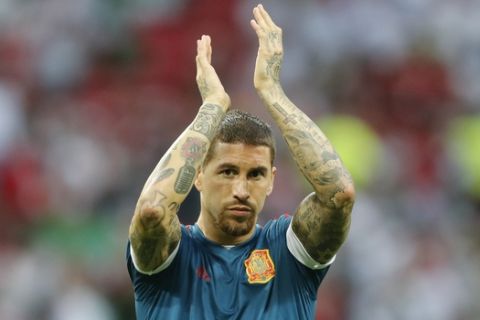 Spain's Sergio Ramos applauds to the fans prior to the group B match between Iran and Spain at the 2018 soccer World Cup in the Kazan Arena in Kazan, Russia, Wednesday, June 20, 2018. (AP Photo/Frank Augstein)