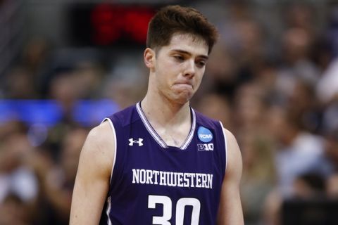 Northwestern guard Bryant McIntosh (30)reacts afterbeing defeated by Gonzaga after a second-round college basketball game in the men's NCAA Tournament, Saturday, March 18, 2017, in Salt Lake City. (AP Photo/George Frey)