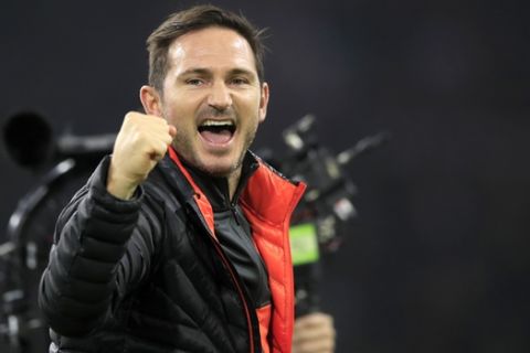 Chelsea's head coach Frank Lampard celebrates at the end of the group H Champions League soccer match between Ajax and Chelsea at the Johan Cruyff ArenA in Amsterdam, Netherlands, Wednesday, Oct. 23, 2019. Chelsea won 1:0. (AP Photo/Peter Dejong)