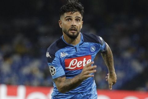Napoli's Lorenzo Insigne in action during the Champions League Group E soccer match between Napoli and Liverpool, at the San Paolo stadium in Naples, Italy, Tuesday, Sept. 17, 2019. Napoli won 2-0. (AP Photo/Gregorio Borgia)