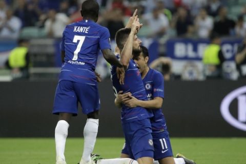 Chelsea's Olivier Giroud, center, celebrates after scoring his side's opening goal during the Europa League Final soccer match between Arsenal and Chelsea at the Olympic stadium in Baku, Azerbaijan, Wednesday, May 29, 2019. (AP Photo/Luca Bruno)