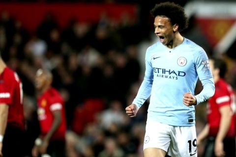 CORRECTS ID OF PLAYER   Manchester City's Leroy Sane celebrates after scoring his side's second goal during the English Premier League soccer match between Manchester United and Manchester City at Old Trafford Stadium in Manchester, England, Wednesday April 24, 2019. (AP Photo/Jon Super)