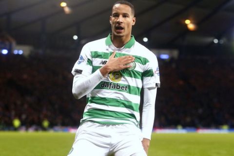 Celtic's Christopher Jullien celebrates scoring his side's first goal of the game during the Scottish Cup soccer Final between Celtic and Rangers at Hampden Park, Glasgow, Scotland, Sunday, Dec. 8, 2019. (Jeff Holmes/PA via AP)