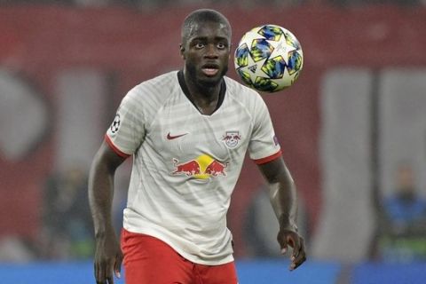 Leipzig's Dayot Upamecano during the Champions League group G soccer match between RB Leipzig and Zenit St. Petersburg in Leipzig, Germany, Wednesday, Oct. 23, 2019. (AP Photo/Jens Meyer)