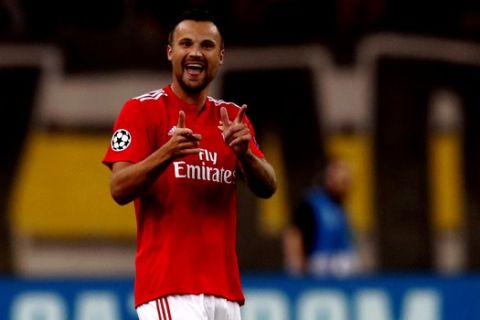 Benfica's Haris Seferovic, celebrates after scoring the opening goal during a Group E Champions League soccer match between AEK Athens and Benfica at the Olympic Stadium in Athens, Tuesday, Oct. 2, 2018. (AP Photo/Thanassis Stavrakis)