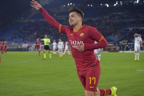 Roma's Cengiz Under celebrates after scoring his side's first goal during the Italian Serie A soccer match between Roma and Lecce at the Olympic stadium in Rome, Sunday, Feb. 23, 2020.  (Fabio Rossi/LaPresse via AP)
