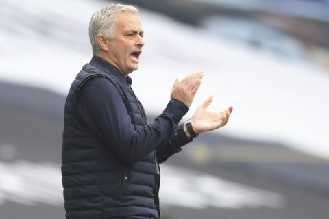 Tottenham's manager Jose Mourinho shouts during the English Premier League soccer match between Tottenham Hotspur and Leicester City, at the Tottenham Hotspur Stadium in London, Sunday, July 19, 2020. (Adam Davy/Pool Photo via AP)