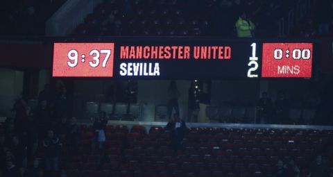 The scoreboard at the end of the match showing that Sevilla defeated Manchester United in the Champions League round of 16 second leg soccer match at Old Trafford in Manchester, England, Tuesday, March 13, 2018. Sevilla won the game 2-1 and go through to the quarterfinals .(AP Photo/Dave Thompson)