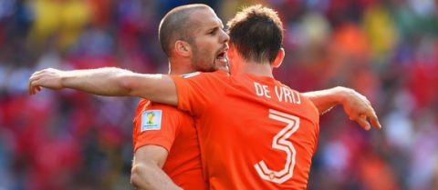 SAO PAULO, BRAZIL - JUNE 23:  Ron Vlaar and Stefan de Vrij of the Netherlands celebrate during the 2014 FIFA World Cup Brazil Group B match between the Netherlands and Chile at Arena de Sao Paulo on June 23, 2014 in Sao Paulo, Brazil.  (Photo by Matthias Hangst/Getty Images)