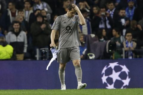 Porto goalkeeper Iker Casillas gestures end of the Champions League quarterfinal, 2nd leg, soccer match between FC Porto and Liverpool at the Dragao stadium in Porto, Portugal, Wednesday, April 17, 2019. (AP Photo/Armando Franca)