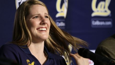 FILE - In this Aug. 23, 2013, file photo, University of California freshman swimmer Missy Franklin smiles during a news conference in Berkeley, Calif. Franklin has won some swim events and finished second in others for the No. 3 Golden Bears, but that's fine with her. The upbeat 18-year-old, who captured four gold medals at the London Olympics and a record six at the recent world championships in Barcelona, Spain, is relishing her new teammates and classes. (AP Photo/Ben Margot, File)