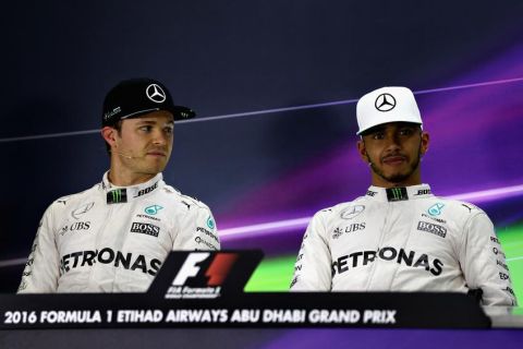 ABU DHABI, UNITED ARAB EMIRATES - NOVEMBER 26:  Top two qualifiers and World Drivers Championship contenders Lewis Hamilton of Great Britain and Mercedes GP and Nico Rosberg of Germany and Mercedes GP in the post qualifying press conference during qualifying for the Abu Dhabi Formula One Grand Prix at Yas Marina Circuit on November 26, 2016 in Abu Dhabi, United Arab Emirates.  (Photo by Mark Thompson/Getty Images)