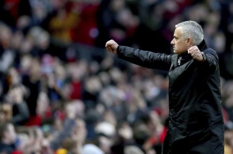 Manchester United manager Jose Mourinho celebrates after Juan Mata scores his side's second goal of the game during their English Premier League soccer match against Fulham at Old Trafford, Manchester, England, Saturday, Dec. 8, 2018. (Barrington Coombs/PA via AP)